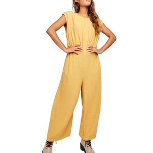 Free people Yellow open back jumpsuit
